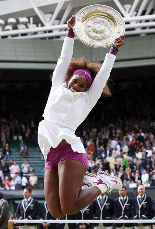 3-Serena-Williams-jumps-in-the-air-after-winning-her-fifth-Wimbledon-ladies-trophy.2.jpg
