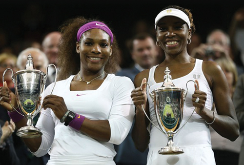4-Serena-with-her-sister-Venus-showing-off-their-Wimbledon-2012-Ladies-Doubles-trophy.1.jpg
